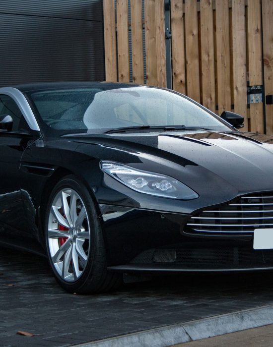 Auto glass technician repairing a cracked windshield